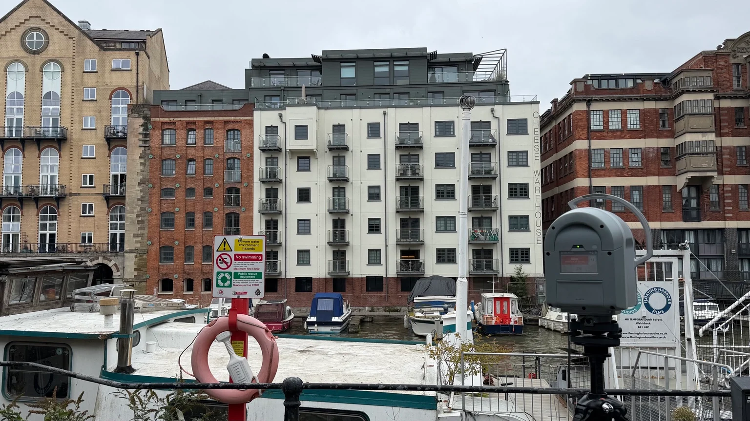Laser scanner facing Huller and Cheese across the canal in Bristol, with the Cheese Warehouse façade visible.