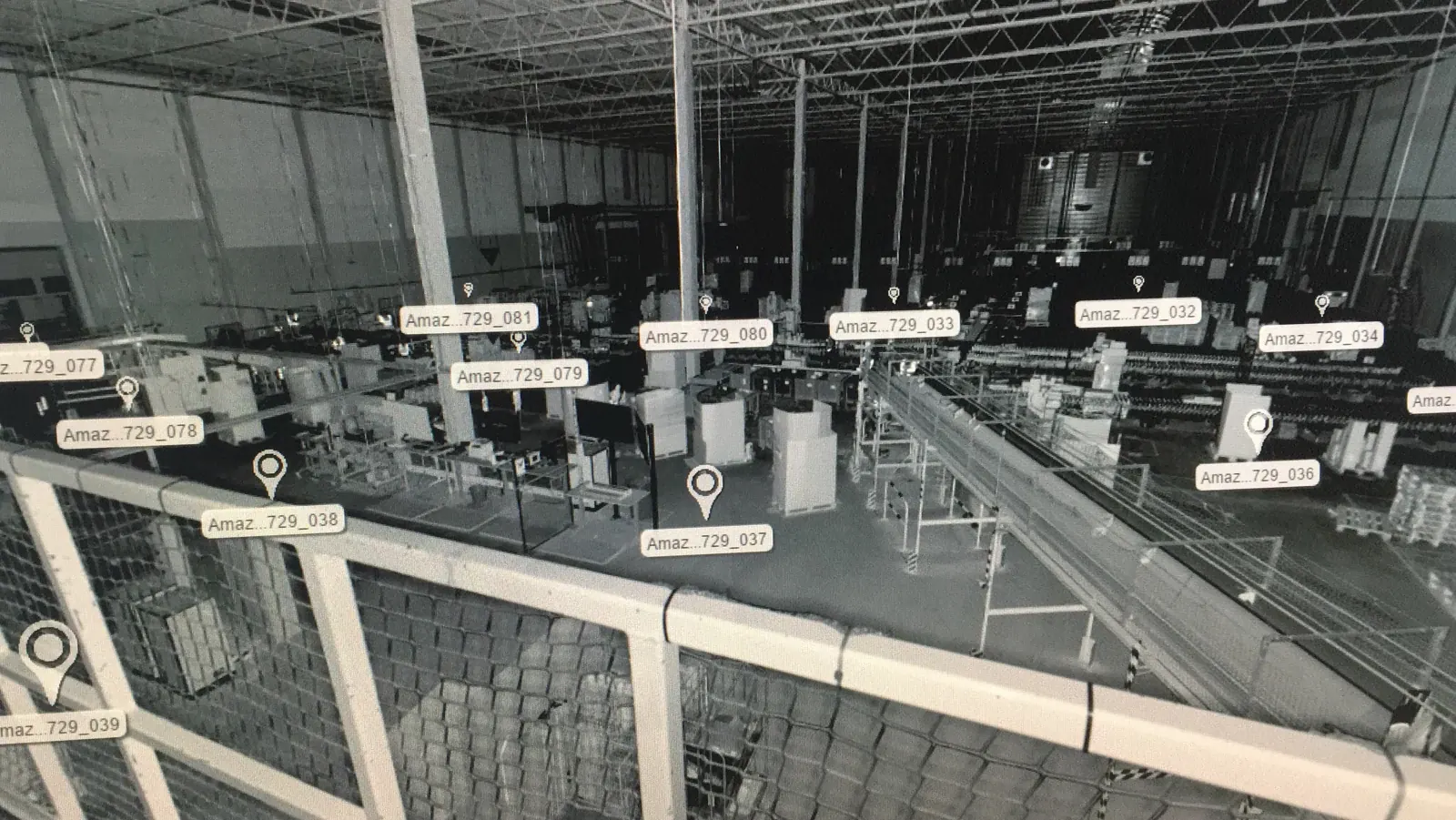 Point cloud view showing an automated warehouse interior with conveyor lines, equipment and storage areas.