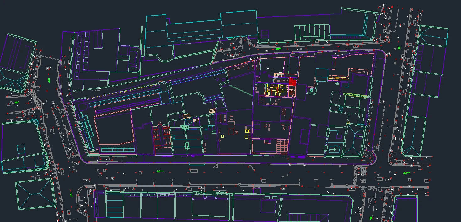 Topographic survey CAD drawing of a building site layout with surrounding roads, kerbs and street features.