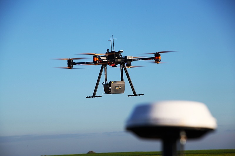 image of drone in flight gnss equipment